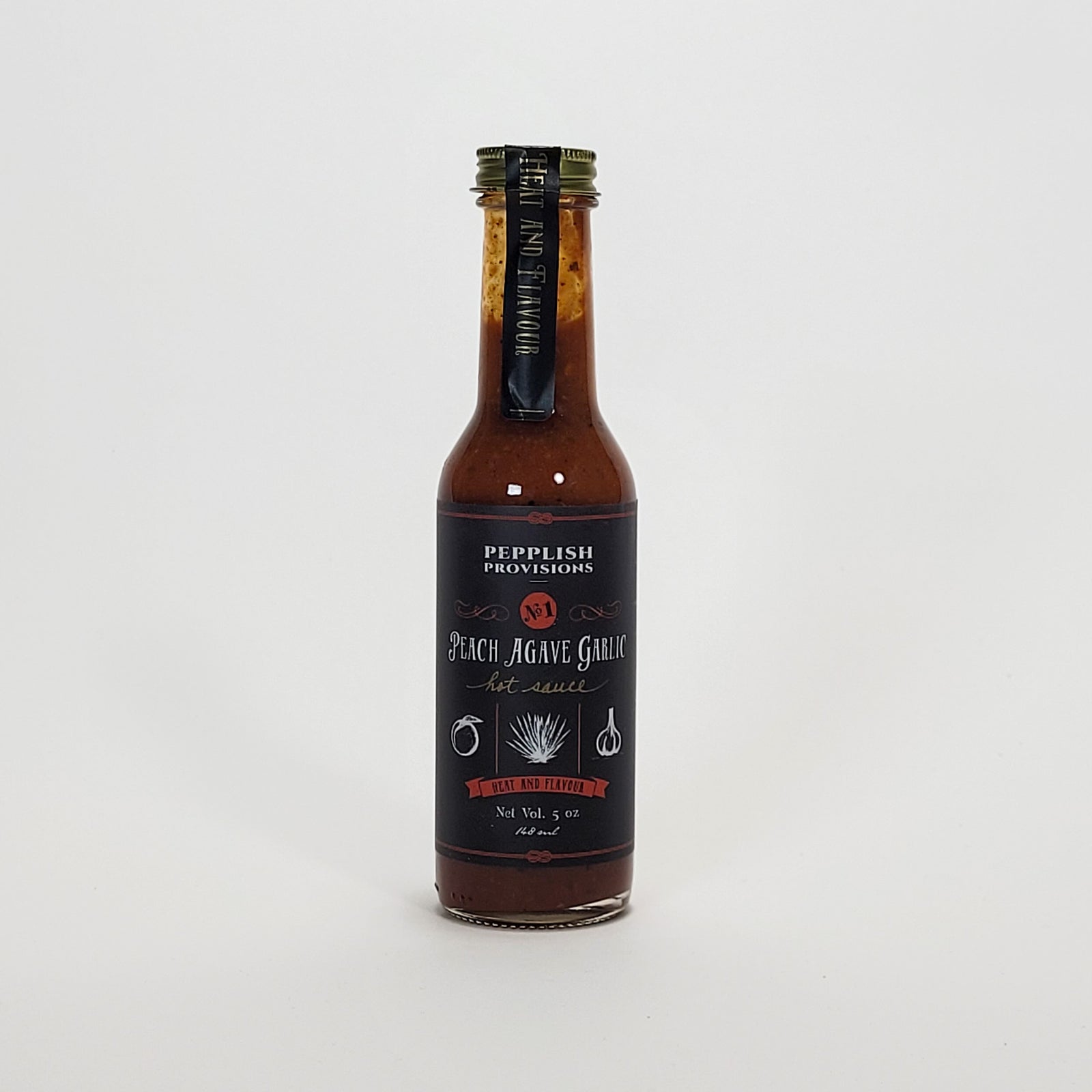 Pepplish Provisions Peach Agave Garlic hot sauce